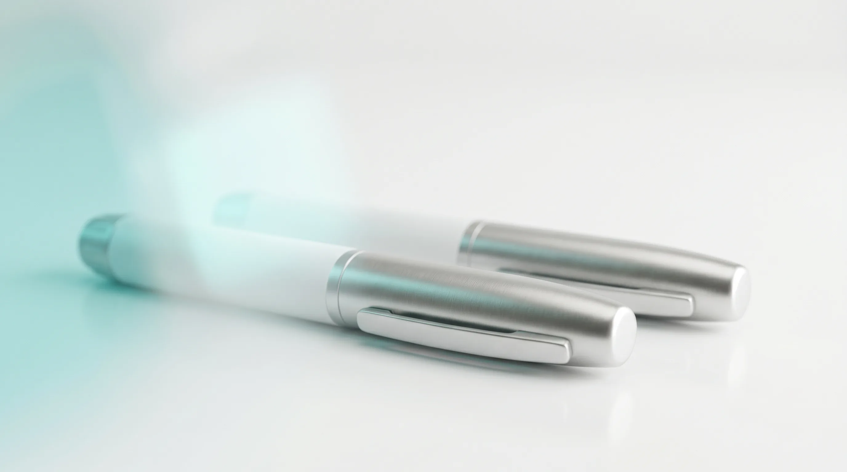 FDA-approved tirzepatide injectable pens Mounjaro and Zepbound on a clean clinical white surface