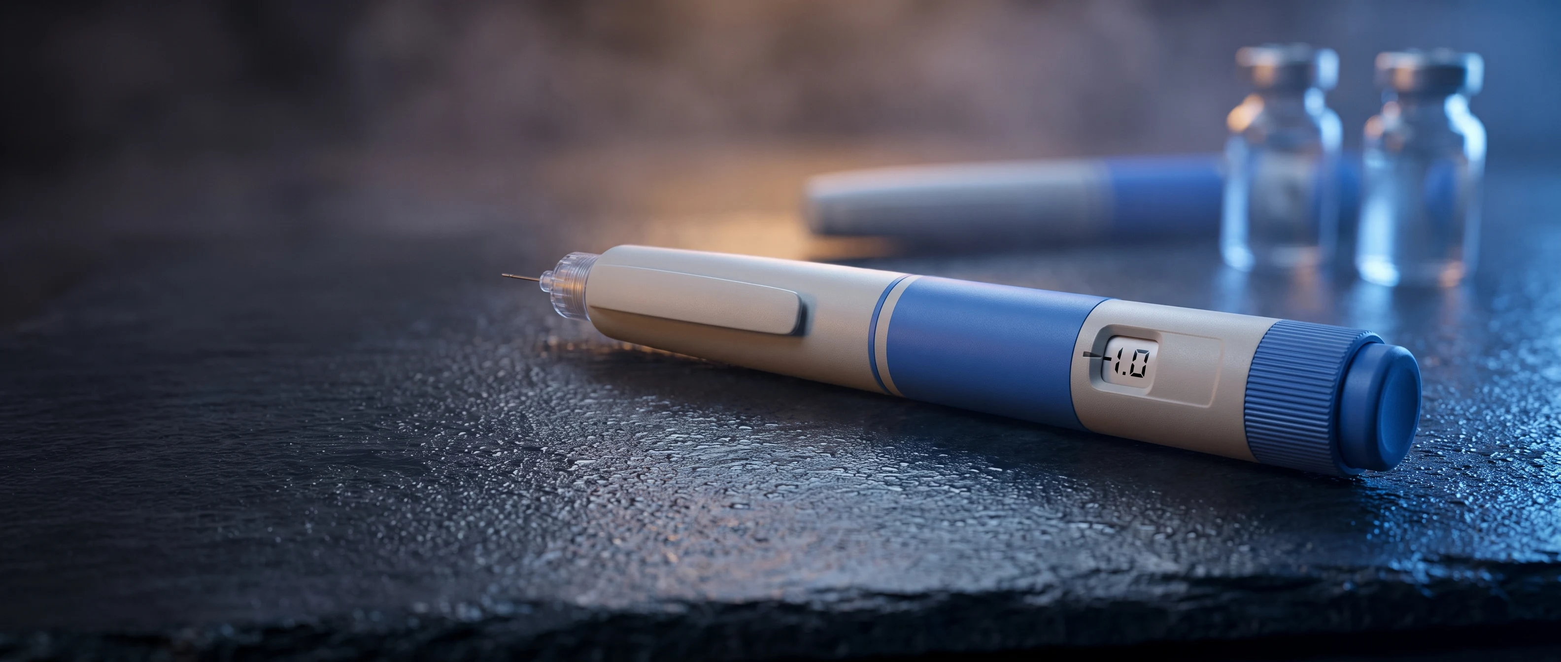 Semaglutide injection pen photographed under blue editorial lighting for a guide on managing constipation.